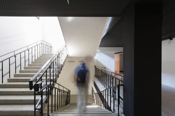 Student walking down the stairs